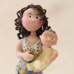 Statuina personalizzata per madrina e padrino con il vostro bimbo in braccio